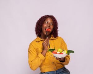 Woman eating fruit 